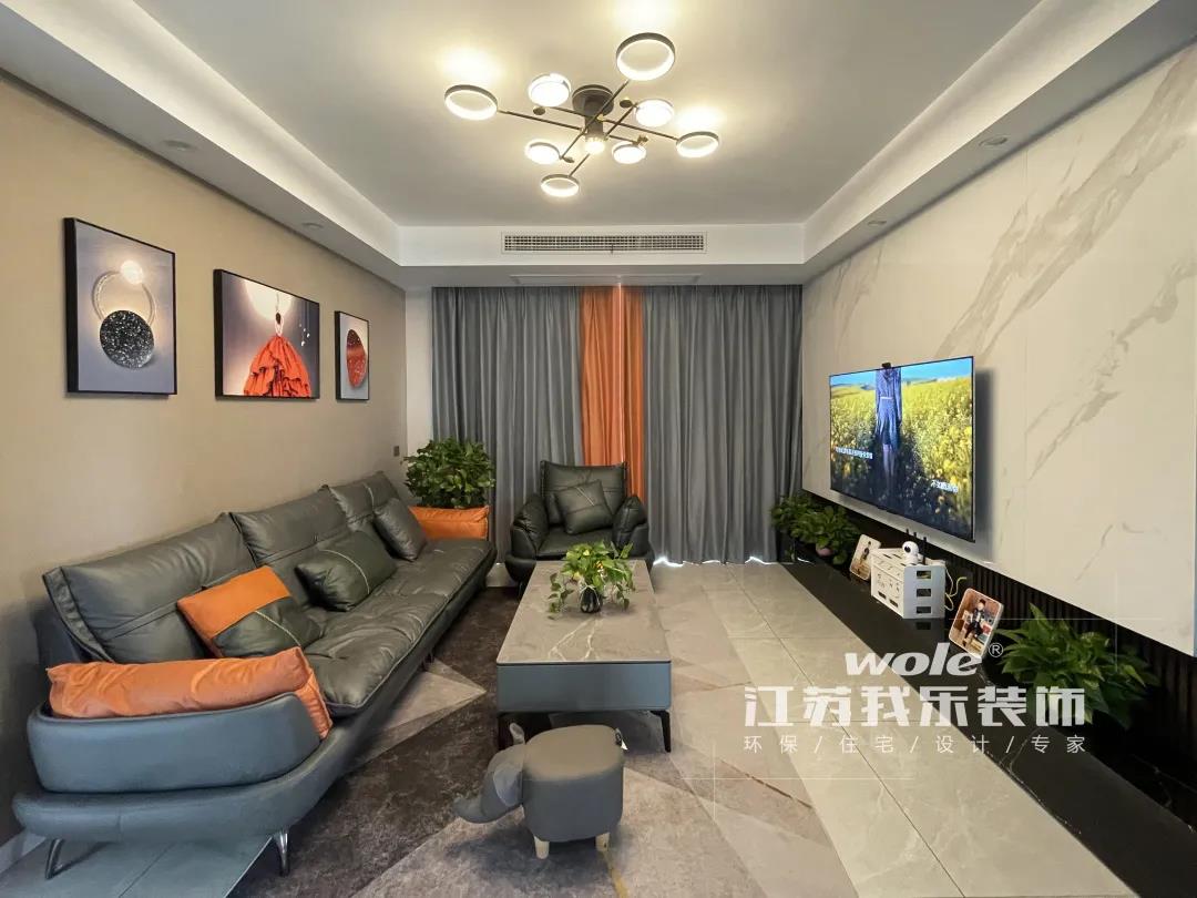 我樂裝飾·實景案例：114㎡現(xiàn)代風(fēng)三居室案例，優(yōu)雅時尚，愛馬仕橙的加入營造出一種秋日暖陽的浪漫！